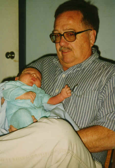 cameron - 3 weeks - held by Ron - #2.jpg (303266 bytes)