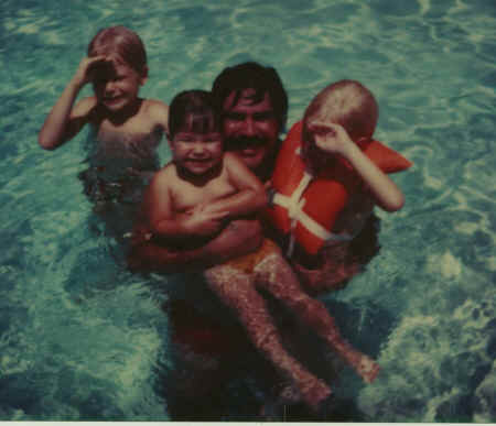 crystal - Father- Brothers - in pool.jpg (101018 bytes)