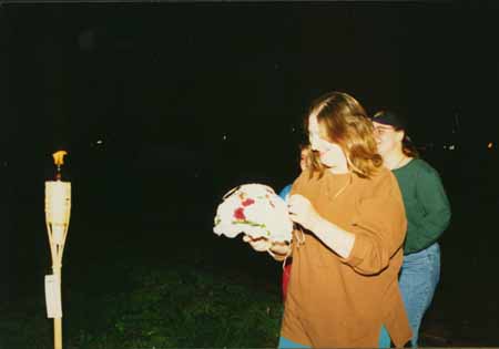 Lynn - catches flower copy.jpg (9141 bytes)