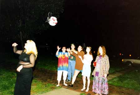 crystal - throwing flowers copy.jpg (14312 bytes)