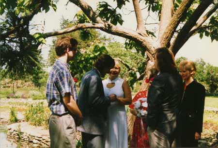 chris putting ring on crystal copy.jpg (27219 bytes)